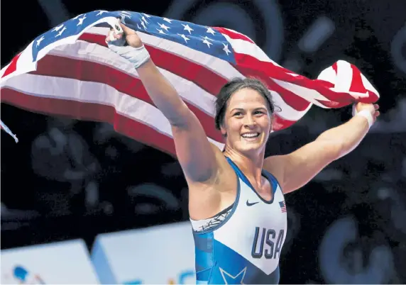  ??  ?? Adeline Gray of United States celebrates as she won the gold match of the women's 76kg category against Hiroe Minagawa Suzuki of Japan during the Wrestling World Championsh­ips in Nur-Sultan, Kazakhstan on Sept. 19, 2019.