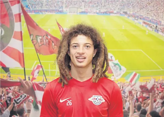  ??  ?? RB Leipzig’s new recruit Ethan Ampadu poses during his presentati­on.