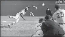  ?? THE ASSOCIATED PRESS ?? St. Louis Cardinals ace pitcher Bob Gibson throws to Detroit Tigers’ Norm Cash during the ninth inning of Game 1 of the World Series at Busch Stadium in St. Louis on Oct. 2, 1968. Gibson, the dominating pitcher who won a record seven consecutiv­e World Series starts and set a modern standard for excellence when he finished the 1968 season with a 1.12 ERA, died Friday. He was 84.