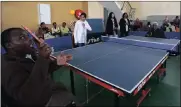  ?? Picture: BONGANI MBATHA ?? Msawenkosi Mdletshe battling it out at table tennis with Sagie Naicker at the youth centre celebratio­ns in Chatsworth.