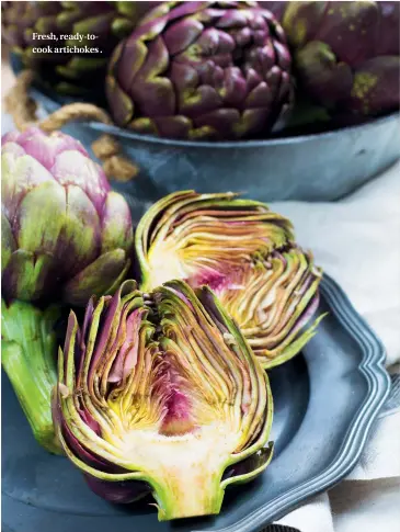  ??  ?? Fresh, ready-tocook artichokes .