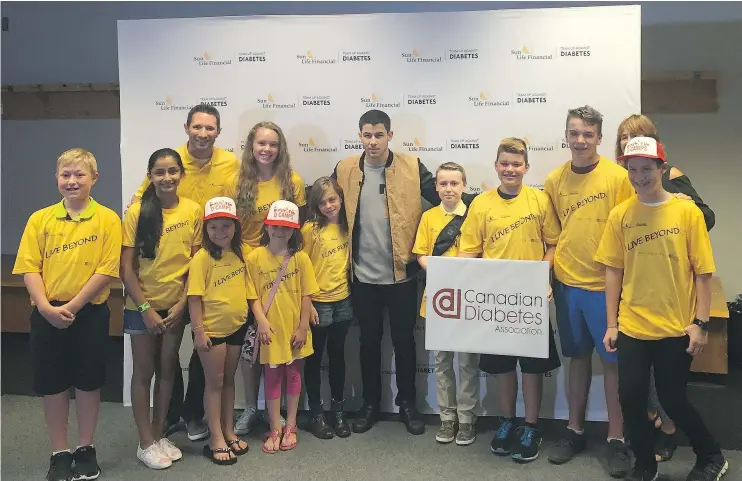  ??  ?? Pop star and Type 1 diabetic Nick Jonas, co-founder of Beyond Type 1, met with local youth in Vancouver’s diabetic community at Rogers Arena Wednesday night.
