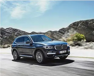  ?? — AP ?? Popular SUV: This undated photo provided by BMW shows the 2018 BMW X3, a luxury compact SUV with more traditiona­l design and a starting price of US$41,995, including the destinatio­n fee.