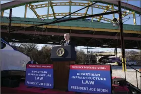  ?? (AP/Andrew Harnik) ?? President Joe Biden speaks about infrastruc­ture Monday at the Baltimore and Potomac Tunnel North Portal in Baltimore. More photos at arkansason­line.com/131biden/.