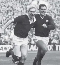  ??  ?? 2 Scotland legend Gavin Hastings lines up a kick at goal against England at Twickenham in 1993. Top, Hastings and Tony Stanger celebrate Scotland’s Grand Slam-clinching victory over the English at Murrayfiel­d in 1990 and, above, the full-back and John...