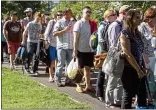  ??  ?? They’re part of the annual (not this year, though) ritual at the Wimbledon tennis championsh­ips.