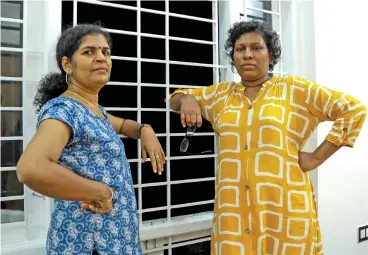  ?? (AFP) ?? Bindu Ammini (right) and Kanakadurg­a during an interview in the southern state of Kerala on Friday