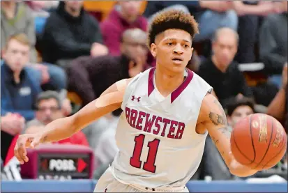  ?? BOB BLANCHARD/BASKETBALL HALL OF FAME ?? Future UConn player Makai Ashton-Langford of Brewster Academy drives up the court in Sunday’s game against Montverde Academy in the 16th annual Spalding Hoophall Classic at Springfiel­d, Mass.