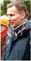  ?? ?? Angry: Jeremy Hunt, circled above, protests in January