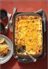  ?? PHOTO COURTESY OF BRIE PASSANO ?? This sausage, egg and grits souffle makes a stellar brunch dish. Taking it to a tailgate or buffet? The egg and grit mixture can be transporte­d in a zip bag, then poured and baked on site.