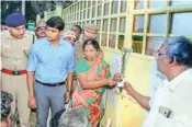  ??  ?? District Collector Sandeep Nanduri along with other officials seal the main gate of Sterlite Copper Unit, in Tuticorin on Monday last week