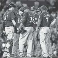  ?? ASSOCIATED PRESS ?? Brewers starting pitcher Wily Peralta is removed from the game in the sixth inning on Tuesday night.