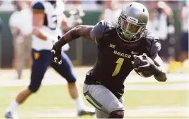  ?? Rod Aydelotte / Associated Press ?? The Texans have kept a close watch on Baylor receiver Corey Coleman with an eye to perhaps drafting him as a complement to DeAndre Hopkins.