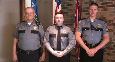  ?? SUBMITTED PHOTO ?? From left, Lorain Police Auxiliary Capt. Don Killinger, Lt. Steve Hernandez and Sgt. Tom Hunter were promoted in an Aug. 22 ceremony at Lorain City Hall.