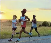  ?? Picture: SUPPLIED ?? STRIDING AHEAD: Cindy Nel, new women's record holder of the Cumakala 10km, and Chumisa Nkanjeni, the first men's 40-49-year category winner, taking the lead.