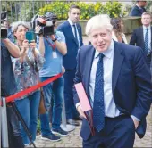  ?? Getty Images/tns ?? British Prime Minister Boris Johnson arrives for a Brexit meeting with Luxembourg’s Prime Minister Xavier Bettel in September in Luxembourg.