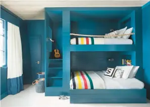  ?? STEPHEN BUSKEN ?? The designers at Studio Life/Style create bunk beds with larger mattresses on the lower level.