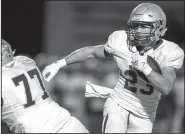  ?? File photo/Arkansas Democrat-Gazette/JEFF GAMMONS ?? Senior running back Gabe Huskey (above), who has verbally committed to Ouachita Baptist University, leads Harrison’s offense with 1,525 yards and 29 touchdowns on 147 carries. For Pulaski Academy, whom the Goblins host in tonight’s Class 5A quarterfin­al, sophomore running back Joe Himon (left) has 1,002 rushing yards and 13 touchdowns. He also has returned four kickoffs for touchdowns.