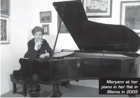  ??  ?? Maryann at her piano in her flat in
Sliema in 2005