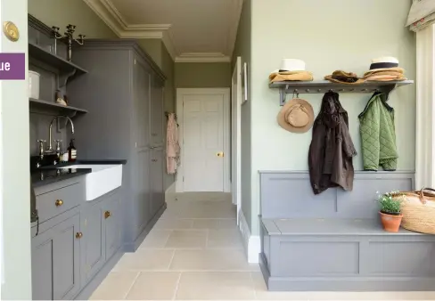  ??  ?? This spacious utility zone features Shakerstyl­e cabinetry from devol’s Classic English range. Laundry rooms ideally need hardwearin­g tiles that will be resistant to scratches and water damage.