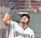  ?? GETTY IMAGES ?? Jesus Aguilar celebrates a solo home run in the third inning, one of three HRs by the Brewers.