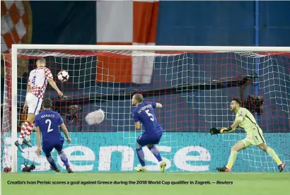  ?? Reuters ?? Croatia’s Ivan Perisic scores a goal against Greece during the 2018 World Cup qualifier in Zagreb. —