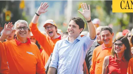  ?? ANDREW LAHODYNSKY­J/THE CANADIAN PRESS ?? Prime Minister Justin Trudeau takes part in the Labour Day Parade in Hamilton, Ont., on Monday.