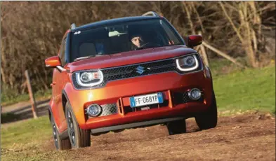  ??  ?? L’Ignis a beau disposer de quatre roues motrices, il se contente d’évoluer en tout-chemin. Suzuki Ignis 1.2 Dualjet Hybrid Allgrip 18040 € 90 ch CO2 : 105 g/km