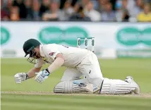  ?? GETTY IMAGES ?? Steve Smith falls to the ground after being struck on the neck by a delivery from England quick Jofra Archer.