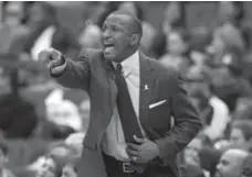  ?? ALEX BRANDON/THE ASSOCIATED PRESS ?? Head coach Dwane Casey has been the linchpin of the Raptors’ remarkable turnaround and deserves a contract extension, writes Cathal Kelly.