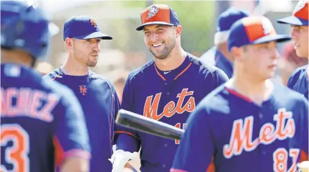  ?? PATRICK DOVE, TREASURE COAST NEWSPAPERS ?? “I’m doing it to pursue what’s in my heart and live out a dream,” Tim Tebow said after his first workout with the Mets.