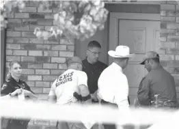  ?? The Dallas Morning News via AP ?? Plano police and the Texas Rangers work the scene of a shooting Monday at a home in the 1700 block of West Spring Creek Parkway in Plano, Texas. Multiple people were fatally shot, and their attacker was killed by a police officer Sunday night,...