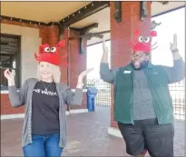  ?? SUBMITTED ?? Kristy Williams, executive director for the River Valley United Way, and Rashad Woods, board member, celebrate and prepare for the upcoming crawfish boil at the Russellvil­le Train Depot.