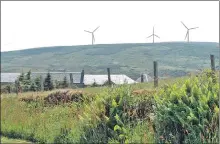  ??  ?? An artist’s impression of the three turbines above Glenbarr.