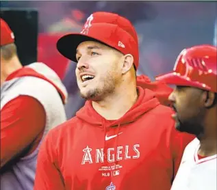  ?? Ryan Sun Associated Press ?? MIKE TROUT says he’s not sure when he injured his left knee, but the soreness worsened in an April 29 game against Philadelph­ia. He plans to return this season and be able to play in the field.