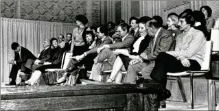  ?? AJC 1986 ?? The Neighborho­od Planning Units concept was begun by then-Mayor Maynard Jackson in 1974 as a way to give a voice to neighborho­od groups. At this 1986 meeting, then-Council member Barbara Asher (standing) was joined by NPU chairmen in urging that changes to the city’s Comprehens­ive Developmen­t Plan should occur only after public hearings were held and not before.