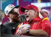  ?? MATT SLOCUM — THE ASSOCIATED PRESS ?? Kansas City Chiefs head coach Andy Reid, right, and tight end Travis Kelce celebrate their Super Bowl victory over the Philadelph­ia Eagles on Sunday.