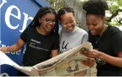  ?? THOBILE MATHONSI African News Agency (ANA) ?? LORETO Convent School matriculan­ts Mahlaste Makhafola, Axolile Mtandeki and Lerato Phoshoko peruse a newspaper for their results. Premier Alan Winde had advised that there are many paths to success. |