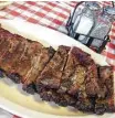  ?? J.C. Reid ?? St. Louis cut ribs with a salt and pepper rub from Pizzitola’s