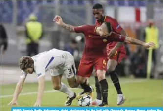  ??  ?? ROME: Roma’s Radja Nainggolan, right, challenges for the ball with Chelsea’s Marcos Alonso during the Champions League group C soccer match between Roma and Chelsea, at the Olympic stadium in Rome. —AP