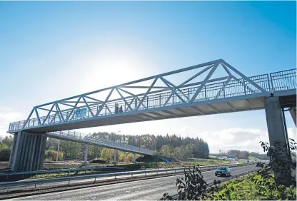  ?? Picture: Kim Cessford. ?? The steel constructi­on was opened by 13-year-old Nathan Roger, who named the bridge the Inveralmon­d Skywalk.