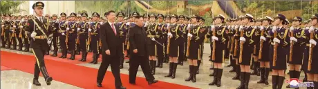  ??  ?? Chinese President Xi Jinping holds a welcoming ceremony for North Korean leader Kim Jong Un on Wednesday