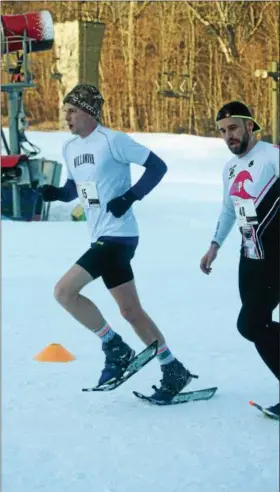  ?? MARIAN DENNIS — DIGITAL FIRST MEDIA ?? Chris O’Sulivan and Evan Daney were the first two racers to cross the finish line Saturday during the Snowshoe Race held at Spring Mountain Adventures in Upper Salford.