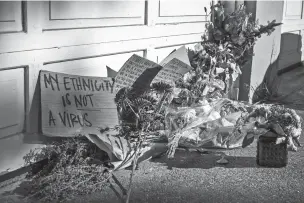  ?? MARK LEONG/FOR THE WASHINGTON POST ?? A memorial for Vicha Ratanapakd­ee, an 84-year-old Thai man who was fatally assaulted Jan. 28, 2021 on his morning walk in San Francisco.