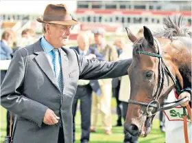  ??  ?? Master of his art: John Dunlop with Times Up, one of his many big-race winners