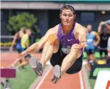  ?? AP FILE ?? At the U.S. Track and Field Championsh­ips in Eugene, Ore., in 2015, Albuquerqu­e native Curtis Beach takes off in the long jump during the decathlon competitio­n.