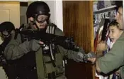  ?? ALAN DIAZ/AP FILE ?? Elian Gonzalez, 6, is found in a closet in Miami.