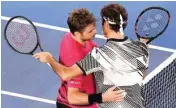  ?? PIC/PTI PIC/PTI ?? Switzerlan­d’s Roger Federer celebrates after defeating compatriot Stan Wawrinka in semi-final of the Australian Open on Thursday Stan Wawrinka, left, congratula­tes compatriot Roger Federer after losing their semifinal at the Australian Open