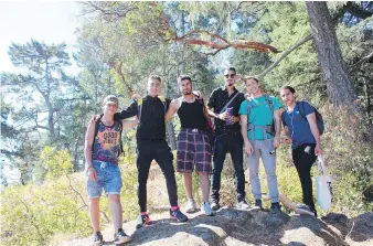  ??  ?? Trip organizer Robin McGeough, second from right, with five of the Syrian refugees. From left: Ahmad Hj, Ayman Al-Sultan, Ammar Kahil, Naim Saban, McGeough and Nor Akash.