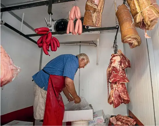  ?? ANDY JACKSON / STUFF ?? After 28 years, Graham and Gloria Putt are ready to sell up and retire from their Mokau business, one of New Zealand’s most remote butcheries.